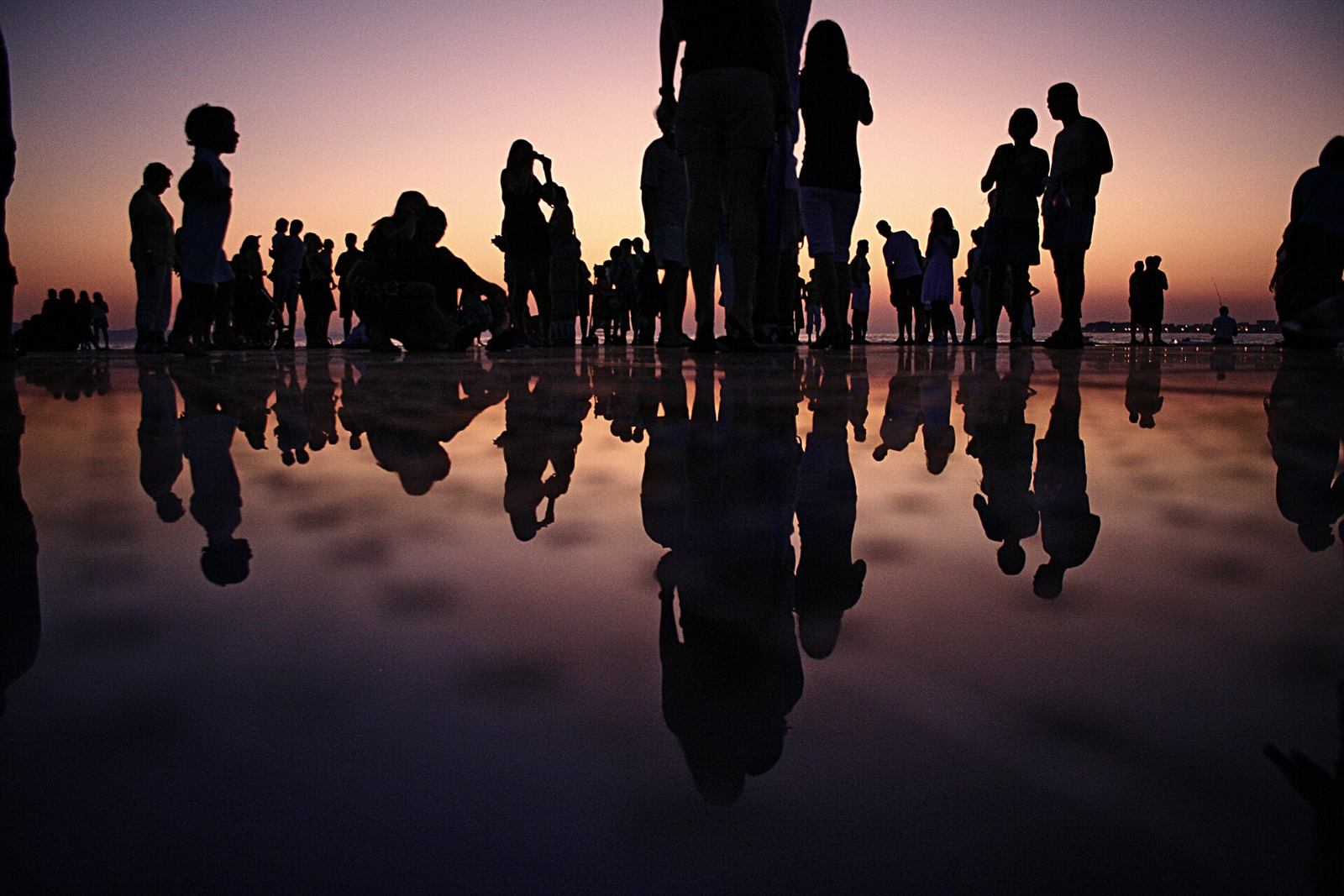 Friends celebrating at sunset